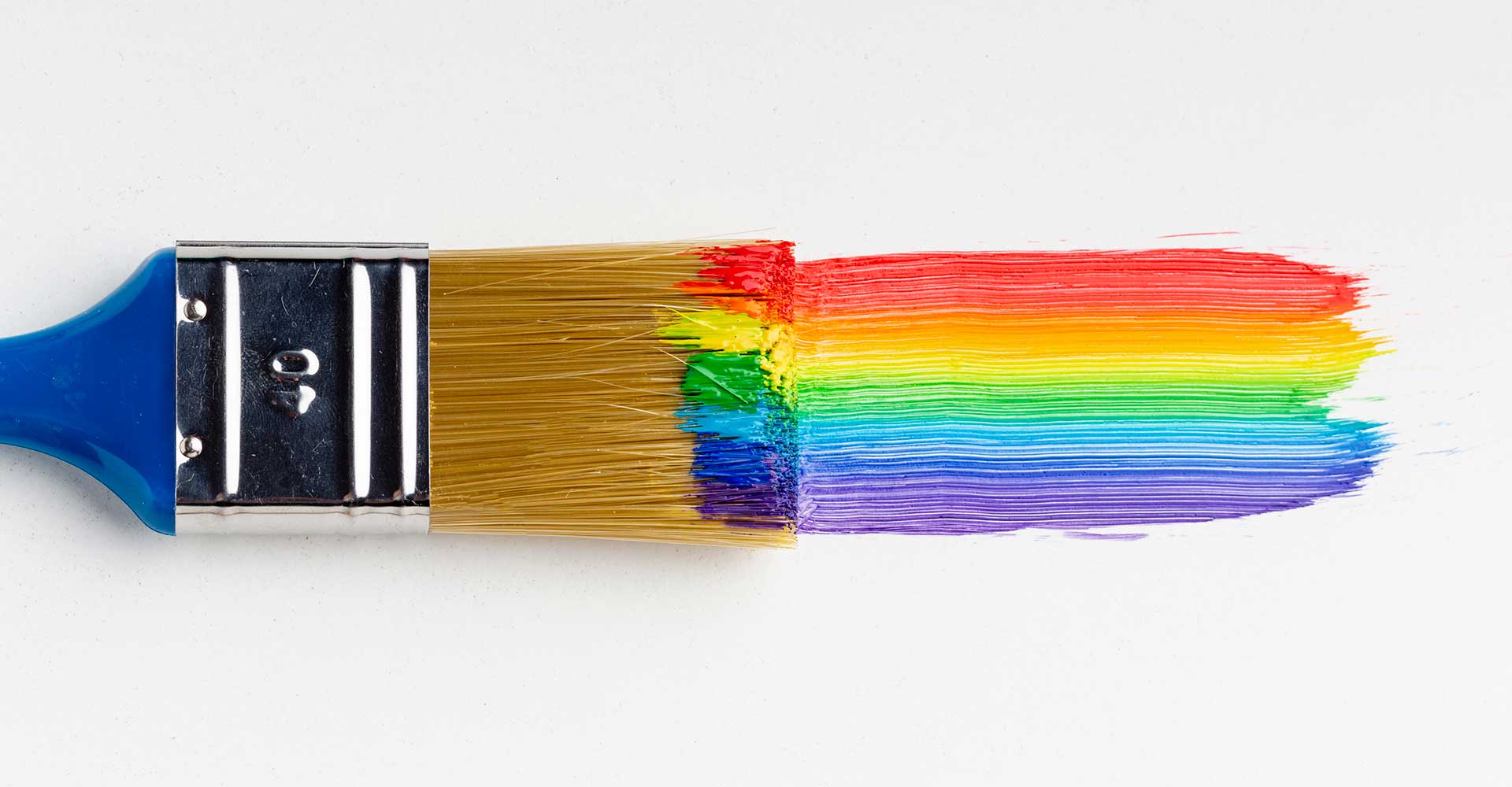 paint brush with rainbow of colors